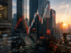 Tokyo’s financial district at sunrise overlaid with semiconductor, industrial automation and market-chart imagery.